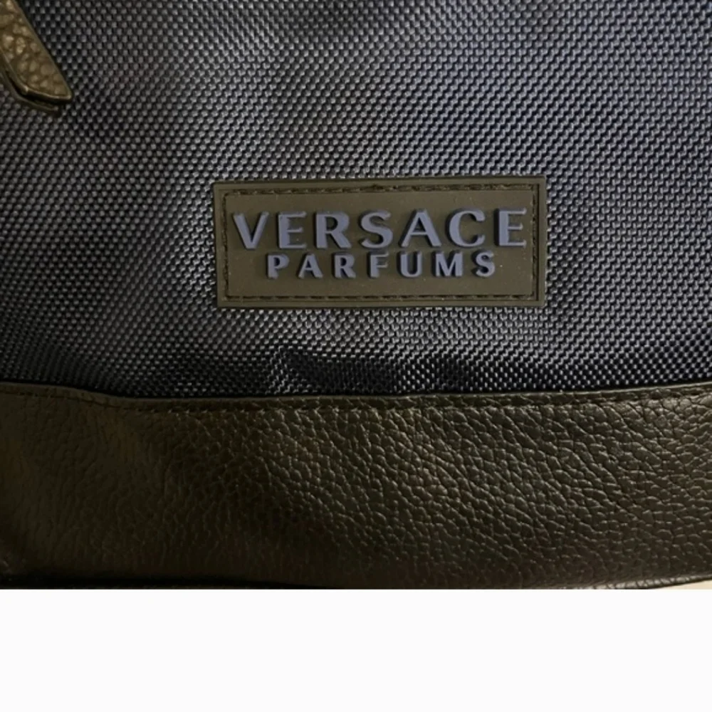 Versace Navy and Black Drawstring Backpack with Front Zip Pocket